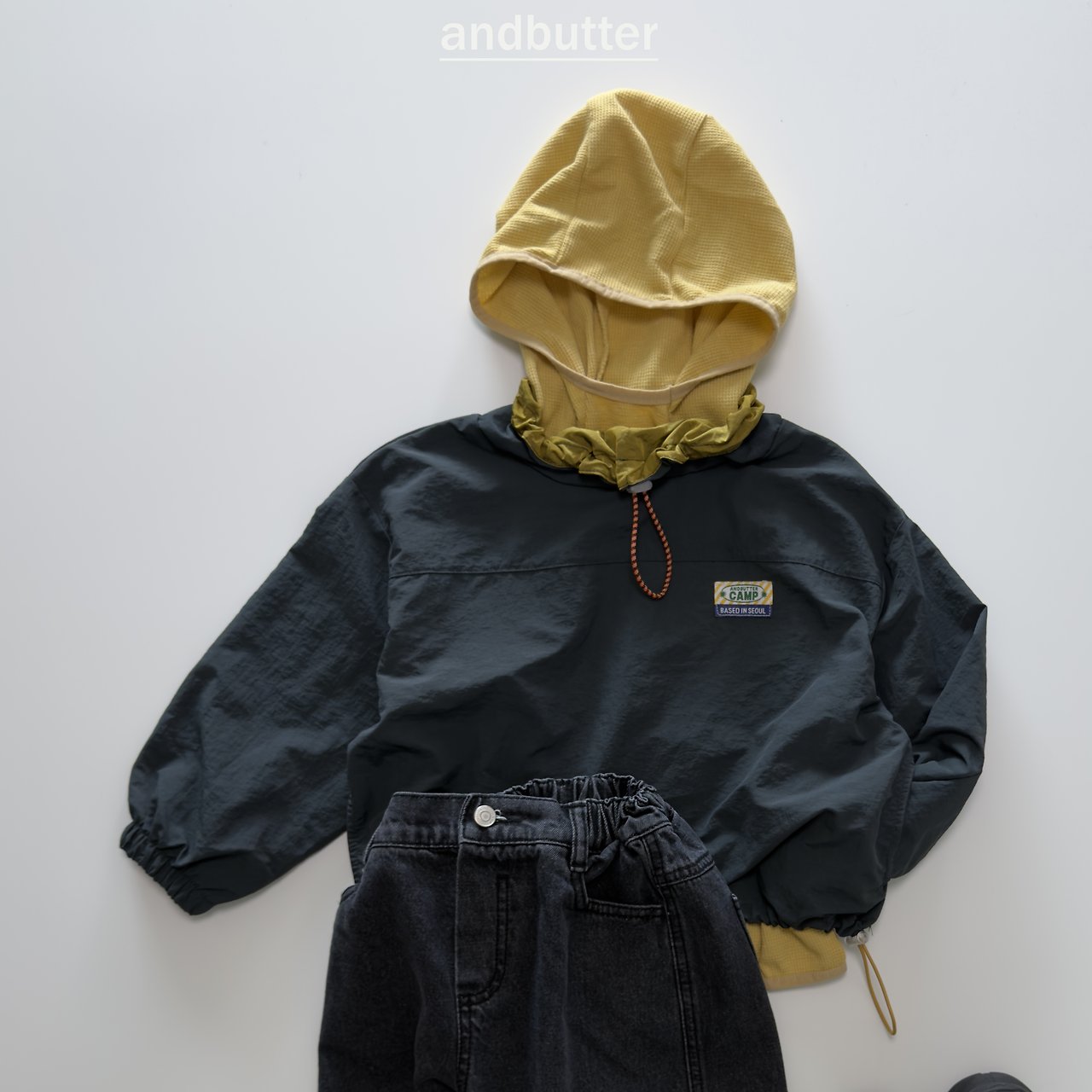《予約》Color Neck Anorak / ANDBUTTER