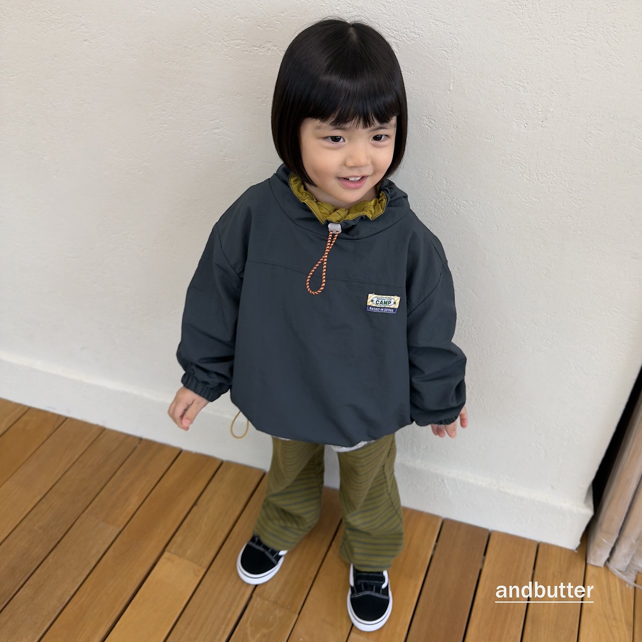《予約》Color Neck Anorak / ANDBUTTER