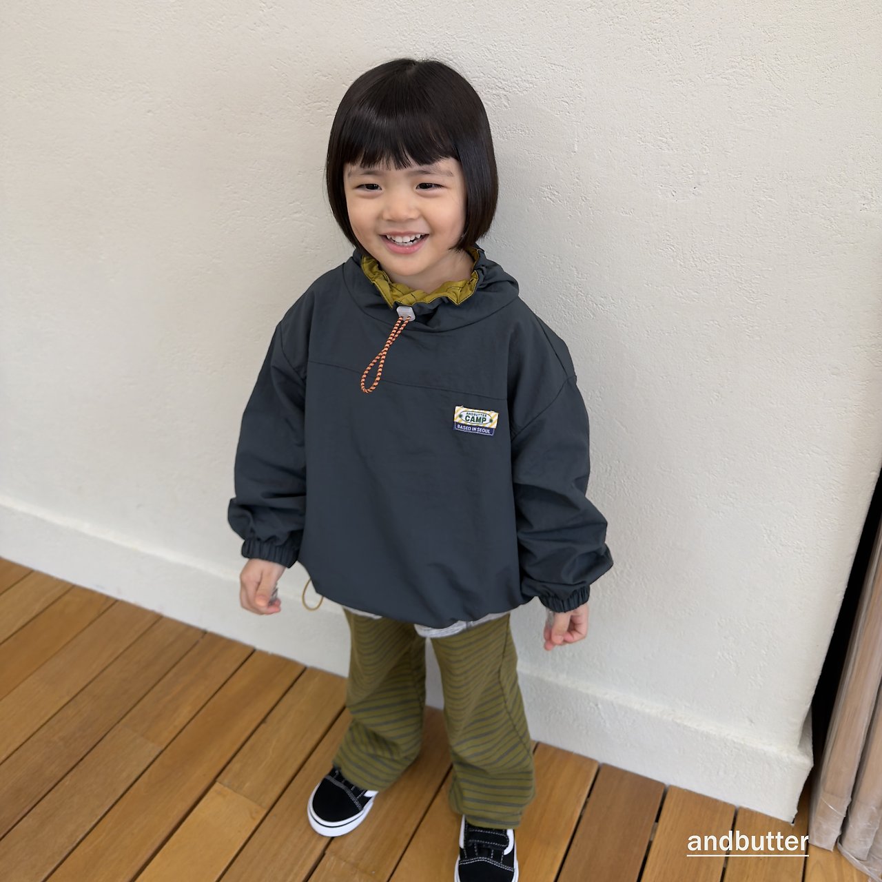 《予約》Color Neck Anorak / ANDBUTTER
