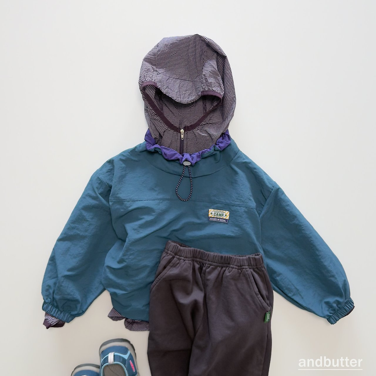 《予約》Color Neck Anorak / ANDBUTTER