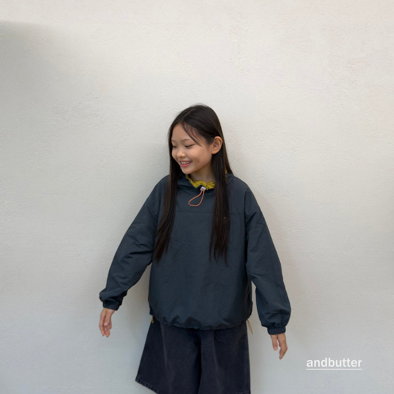 《予約》Color Neck Anorak / ANDBUTTER
