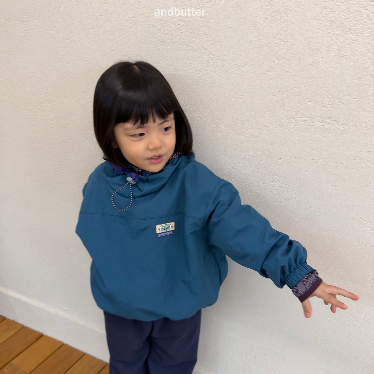 《予約》Color Neck Anorak / ANDBUTTER