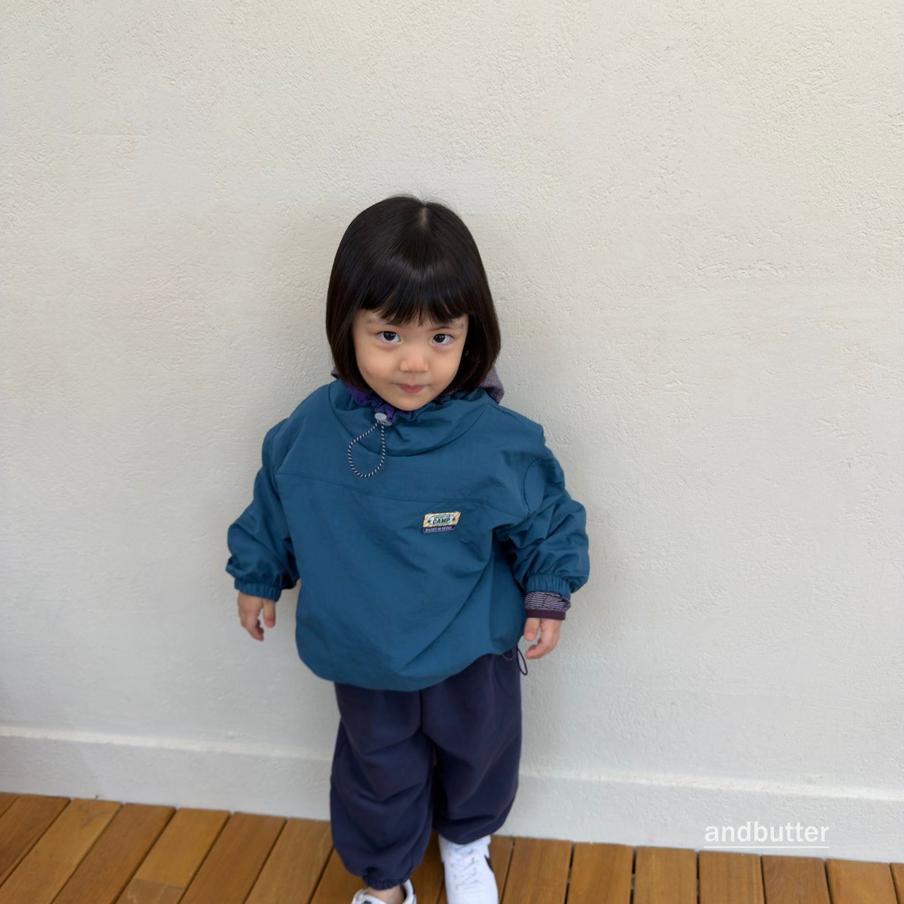 《予約》Color Neck Anorak / ANDBUTTER