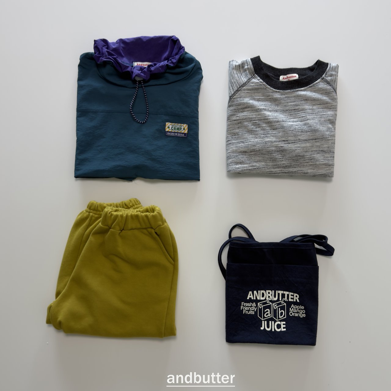 《予約》Color Neck Anorak / ANDBUTTER