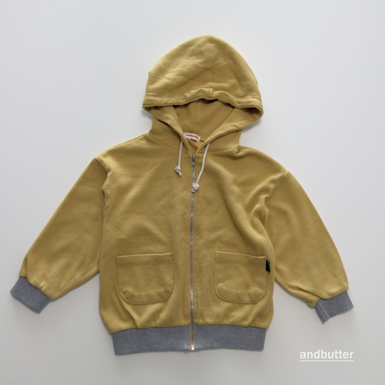《予約》Tone-on-Tone Pocket Zip-Up Hoodie / ANDBUTTER