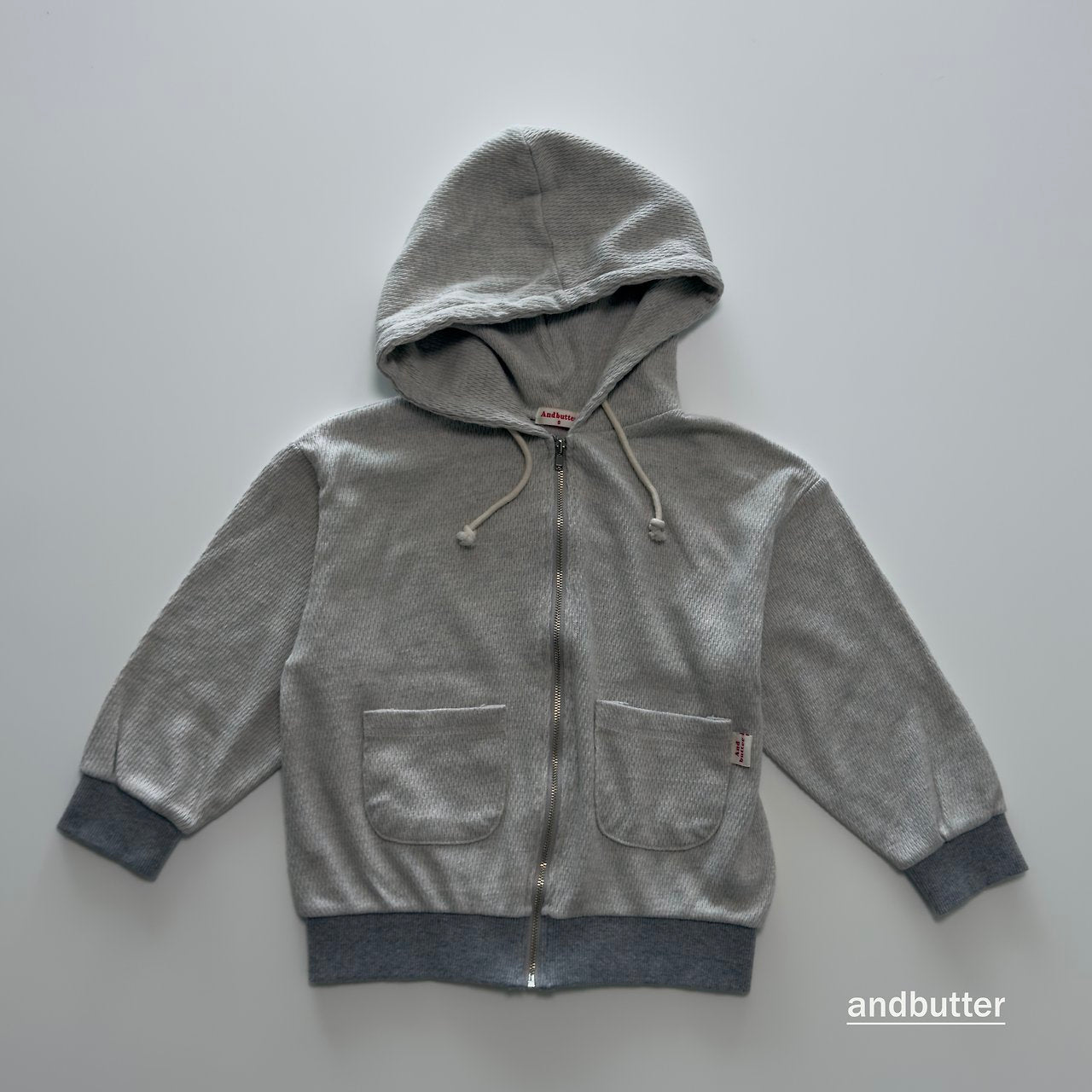 《予約》Tone-on-Tone Pocket Zip-Up Hoodie / ANDBUTTER