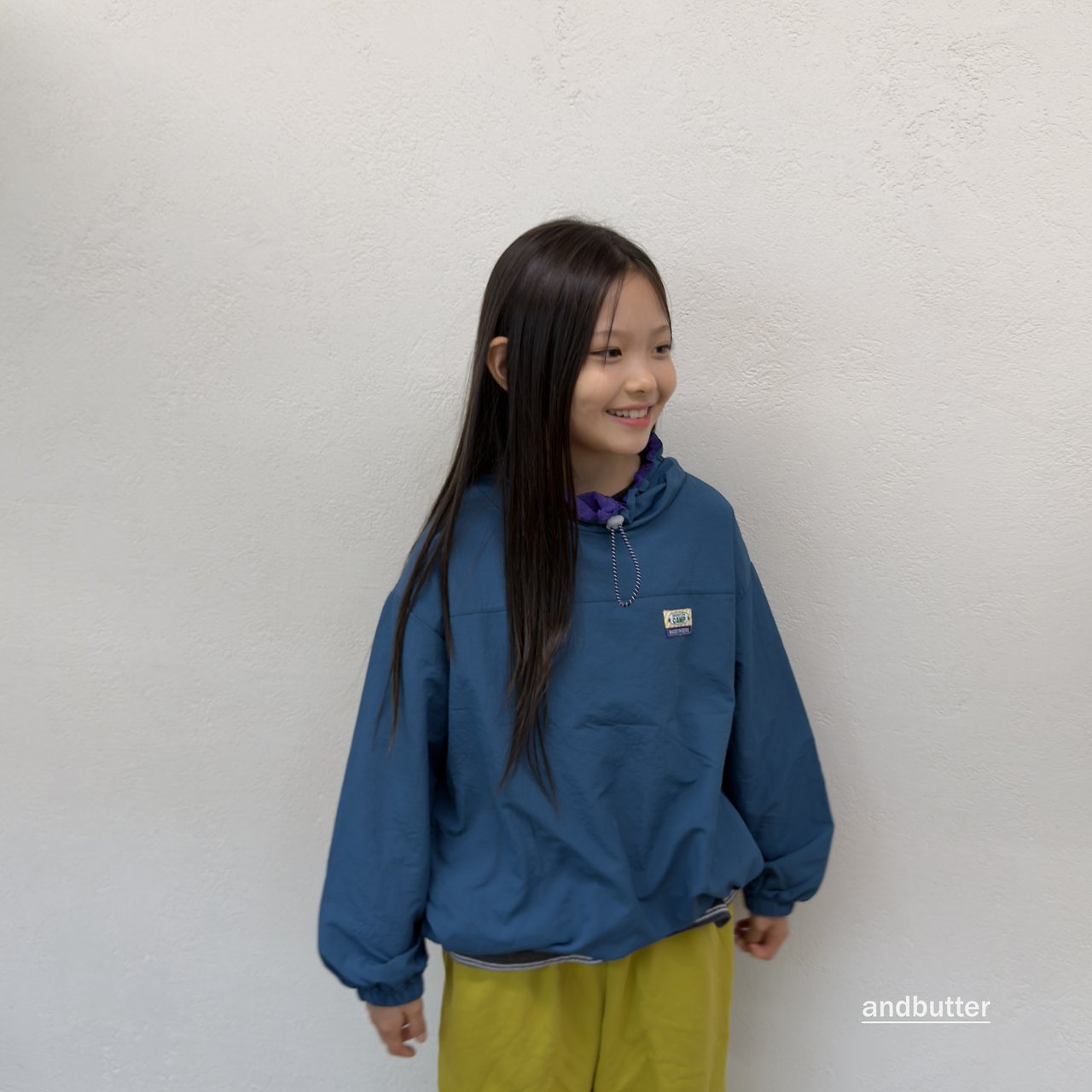 《予約》Color Neck Anorak / ANDBUTTER