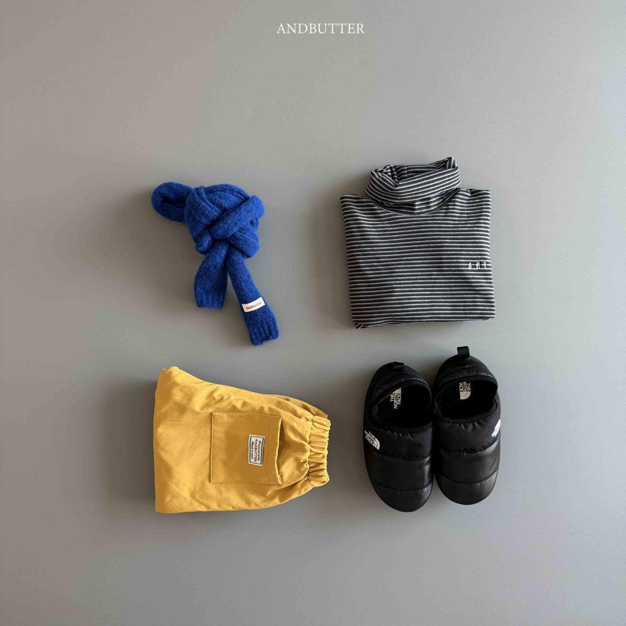 《予約》Art Stripe Turtleneck / andbutter