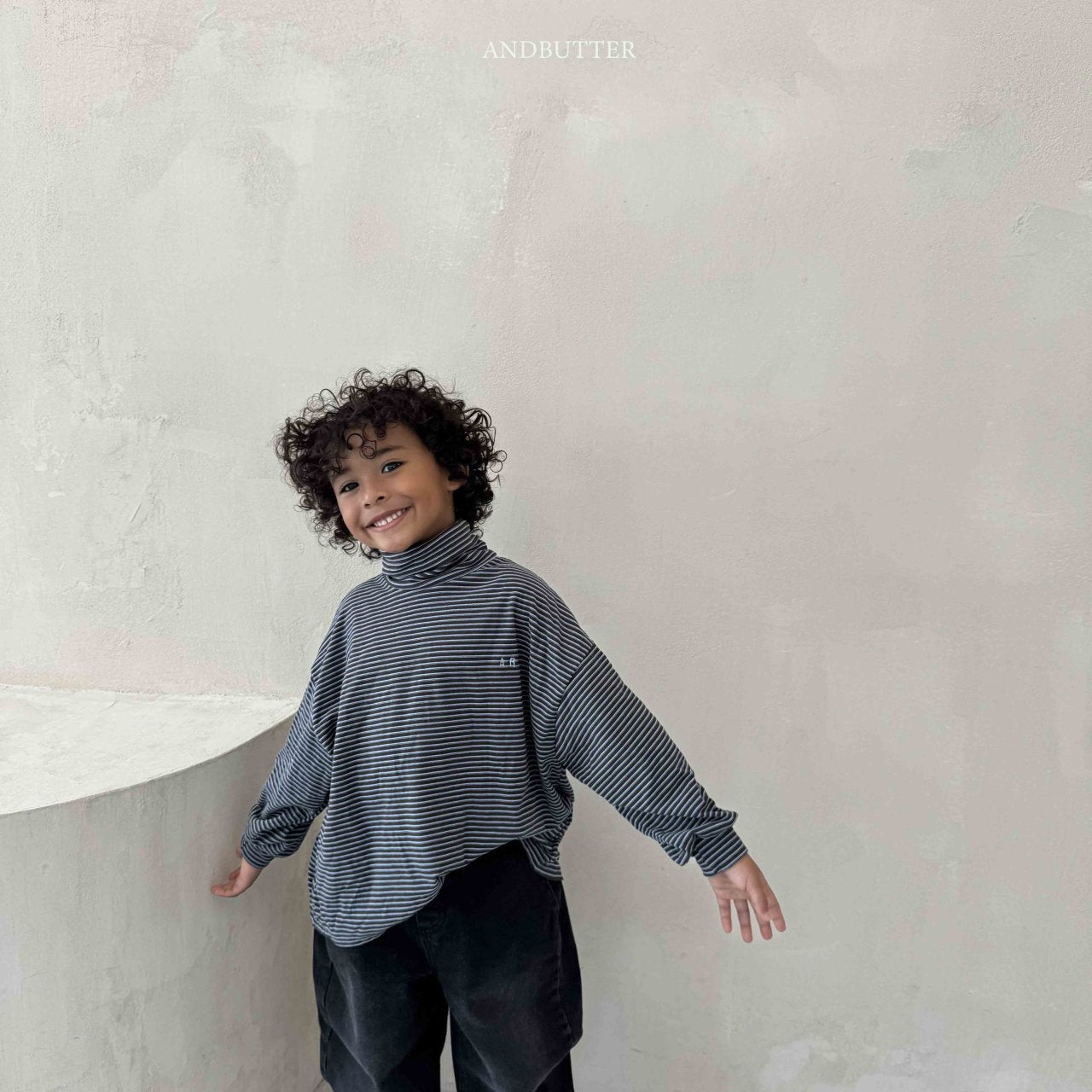 《予約》Art Stripe Turtleneck / andbutter