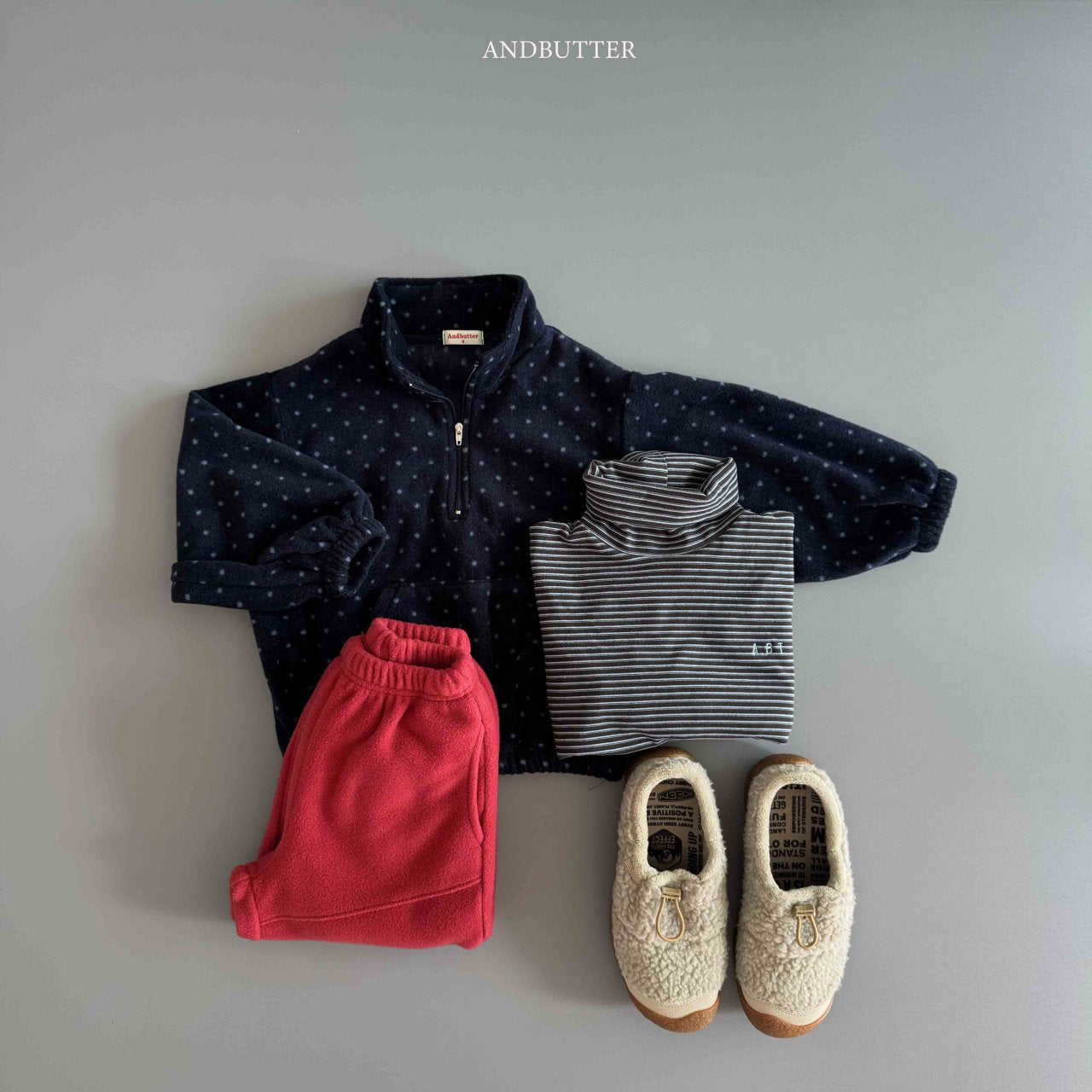 《予約》Dot Half-Zip / andbutter