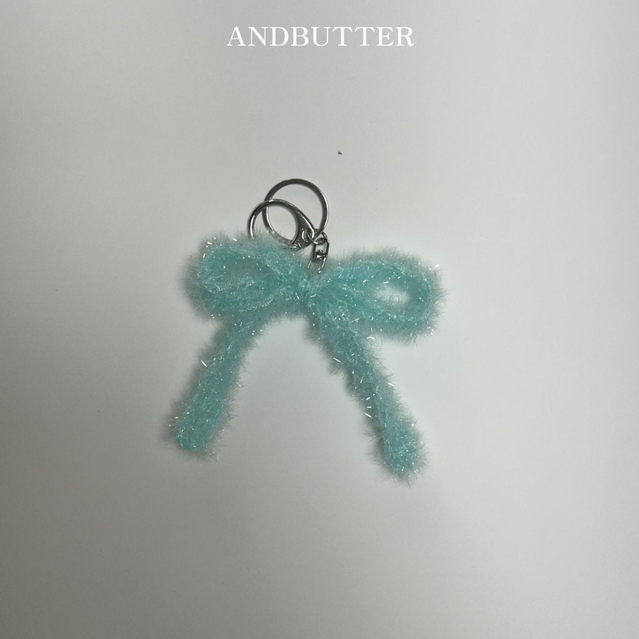 《予約》Twinkly Ribbon Keyring / andbutter